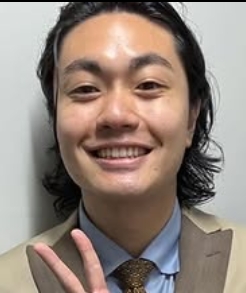 笑顔で写真に映るたいがさん
