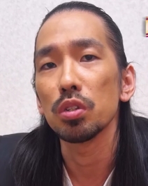 ヒゲを生やした川北茂澄